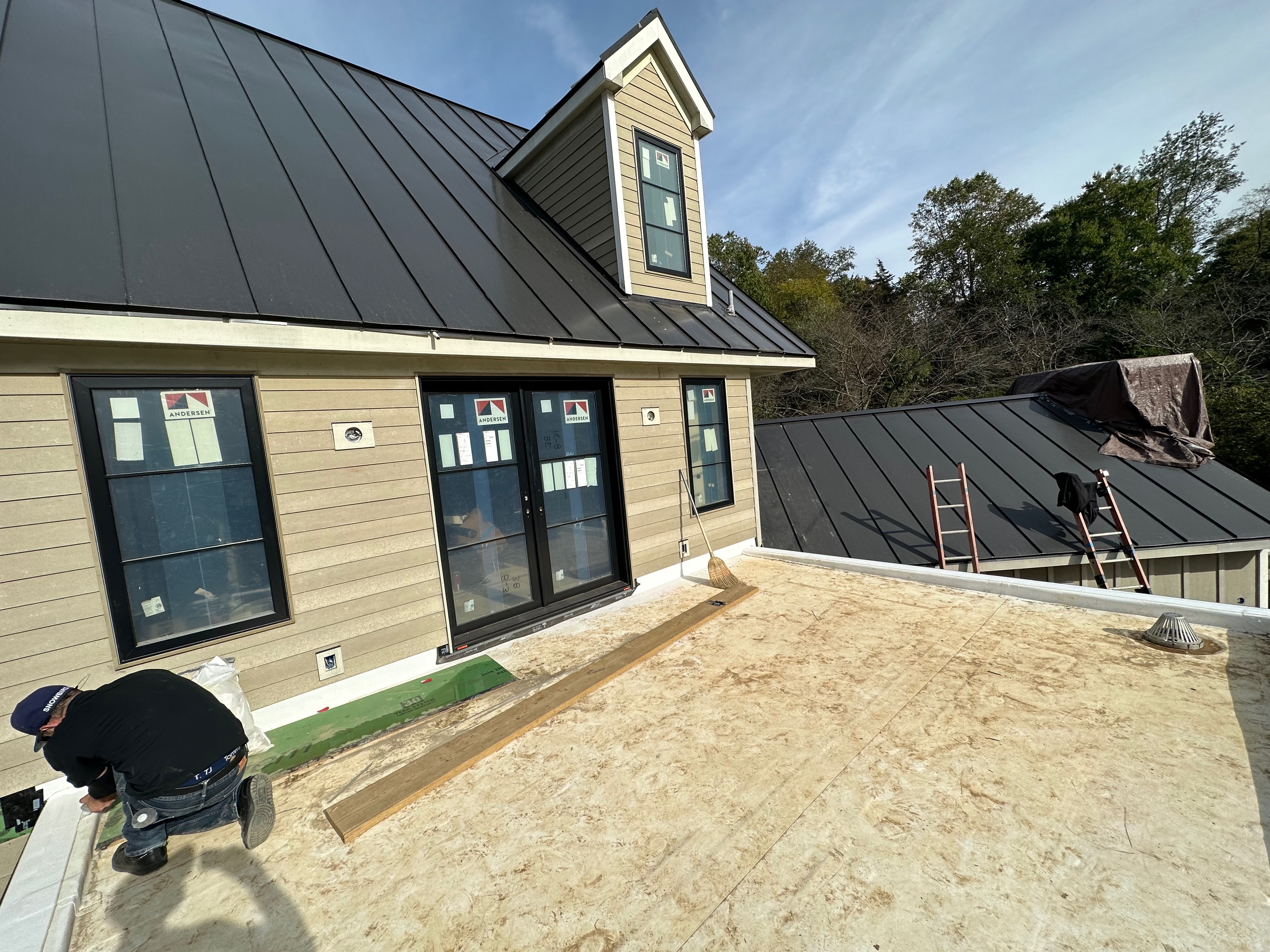 Standing seam metal roof on a modern farmhouse in Northern Virginia